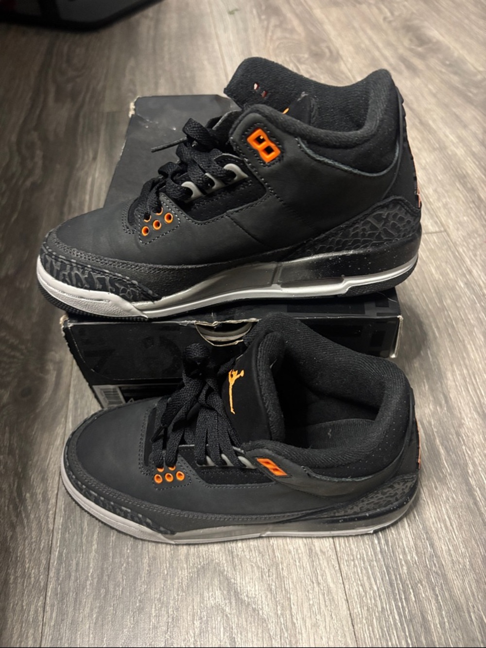 Jordan big kids Black Sneakers with Orange Accents